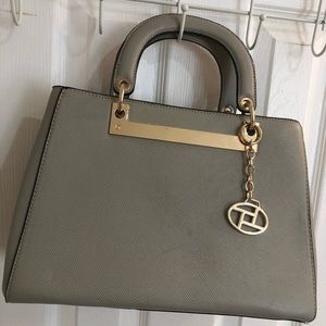 Gray and gold leather purse